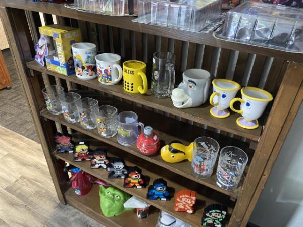Various mugs across media franchises at Magpie and Crow