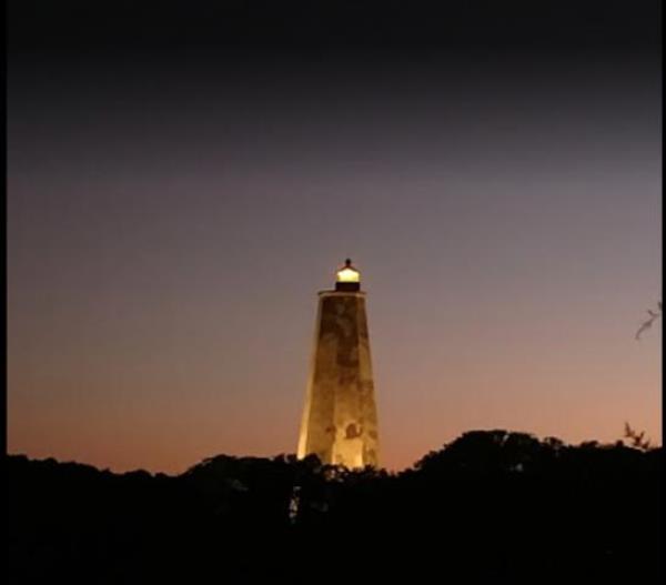 Old Baldy lighthouse lit up at night. Photo courtesy of the Old Baldy Foundation.