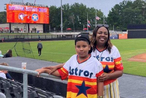 McPhaul and her son Charles are big fans of the Fayetteville Woodpeckers. They love attending games and cheering on the team.