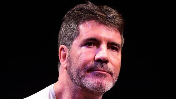 Simon Cowell visits The BRIT School and the Nordoff Robbins facility in the grounds ahead of being ho<em></em>noured at this year..s Music Industry Trusts Award (MITS) - an event held to raise mo<em></em>ney for these charities...  London. PRESS ASSOCIATION Photo. Picture date: Tuesday September 29, 2015. Photo credit should read: Ian West/PA Wire